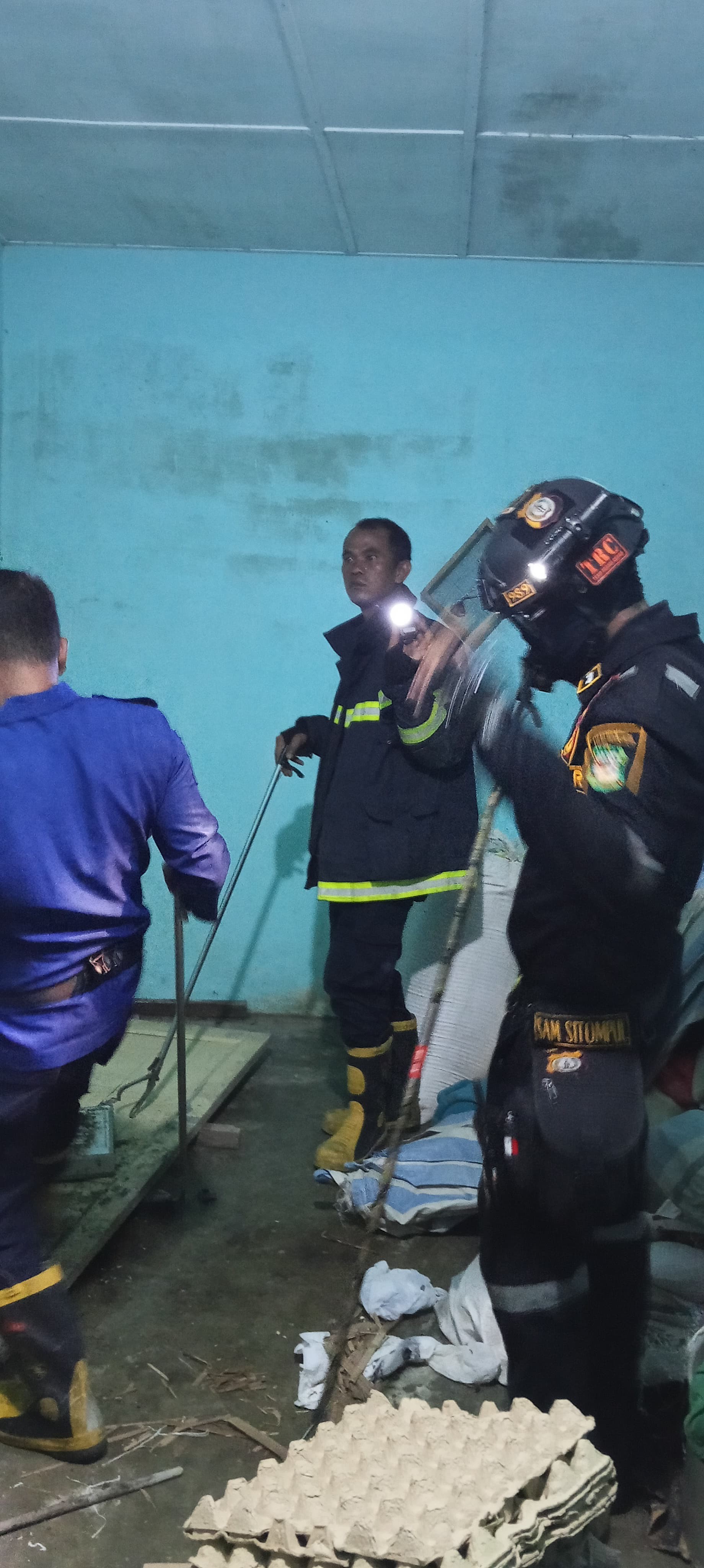 menerima informasi adanya Ular di rumah warga yang beralamat di Jl. Nauli Sianjur