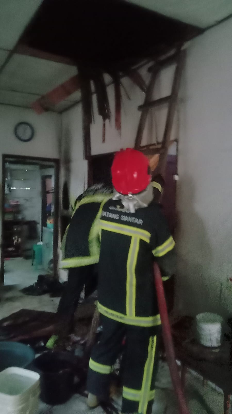 Pemadaman Kebakaran rumah warga di Jl. Raya Sidamanik
