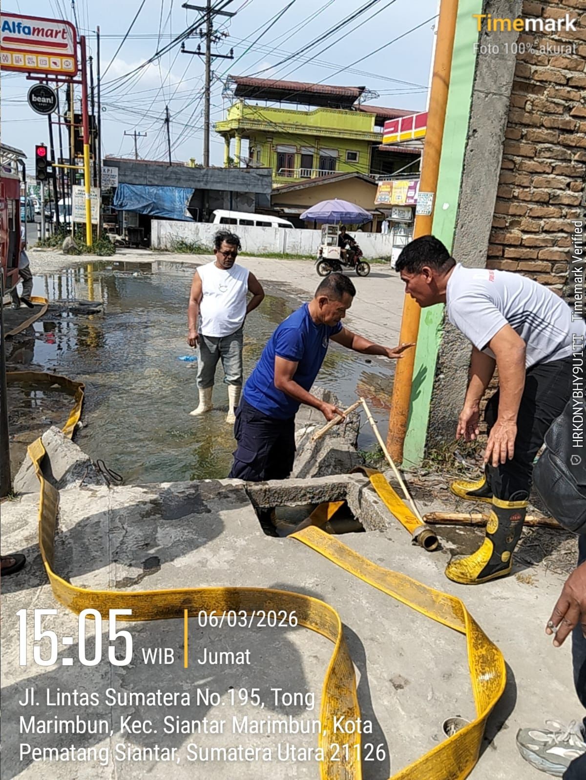 penyemprotan parit sumbat di  Jl. Matio